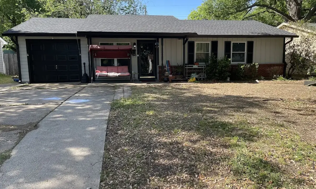 Asphalt Shingle Roof Repair crew at work on a residential roof in Durant